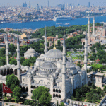 Aerial view of Istanbul featuring the Blue Mosque, Hagia Sophia, and the Bosphorus Strait, showcasing Turkey’s rich history and architecture.