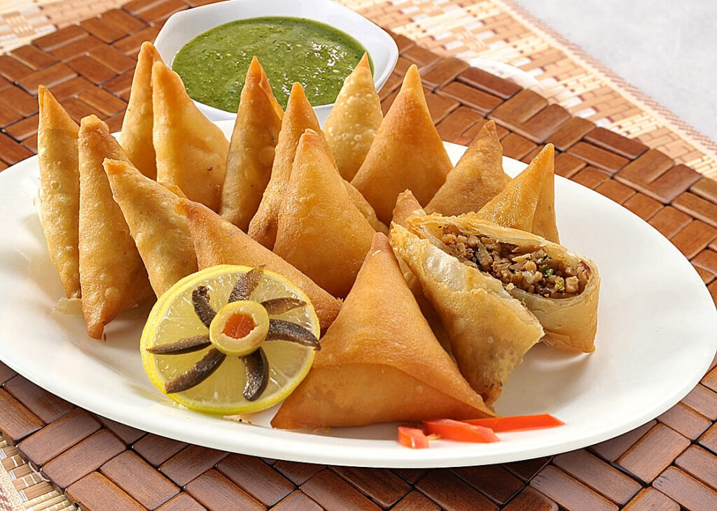 qeema samosa in a plate