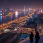 Nighttime view of Beijing city skyline with illuminated skyscrapers, bustling streets, and vibrant neon lights showcasing life in modern China