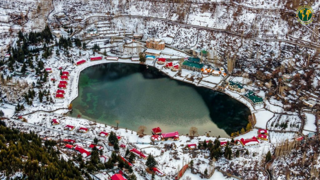 Shangrila Lake Skardu frozen in winter with snow covered pines and mountains